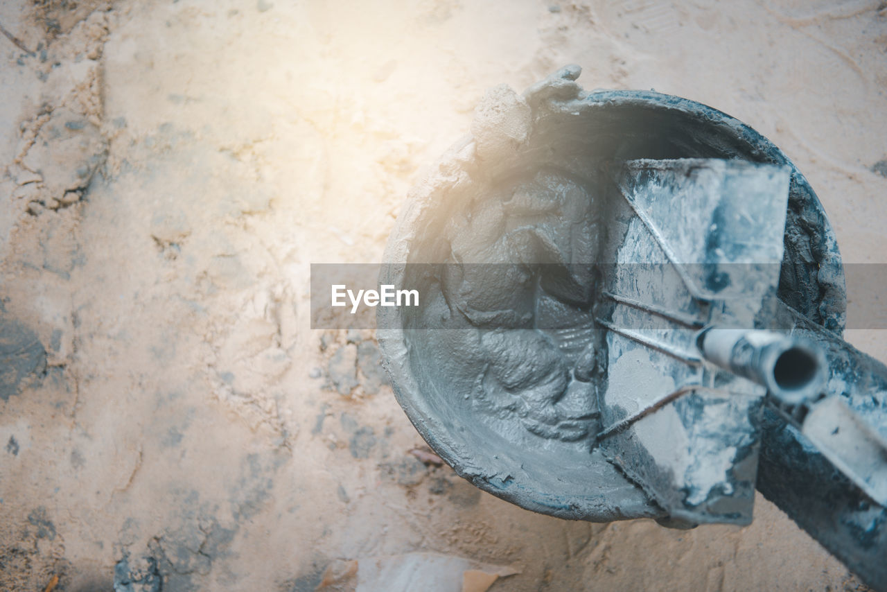 Directly above shot of concrete in bucket