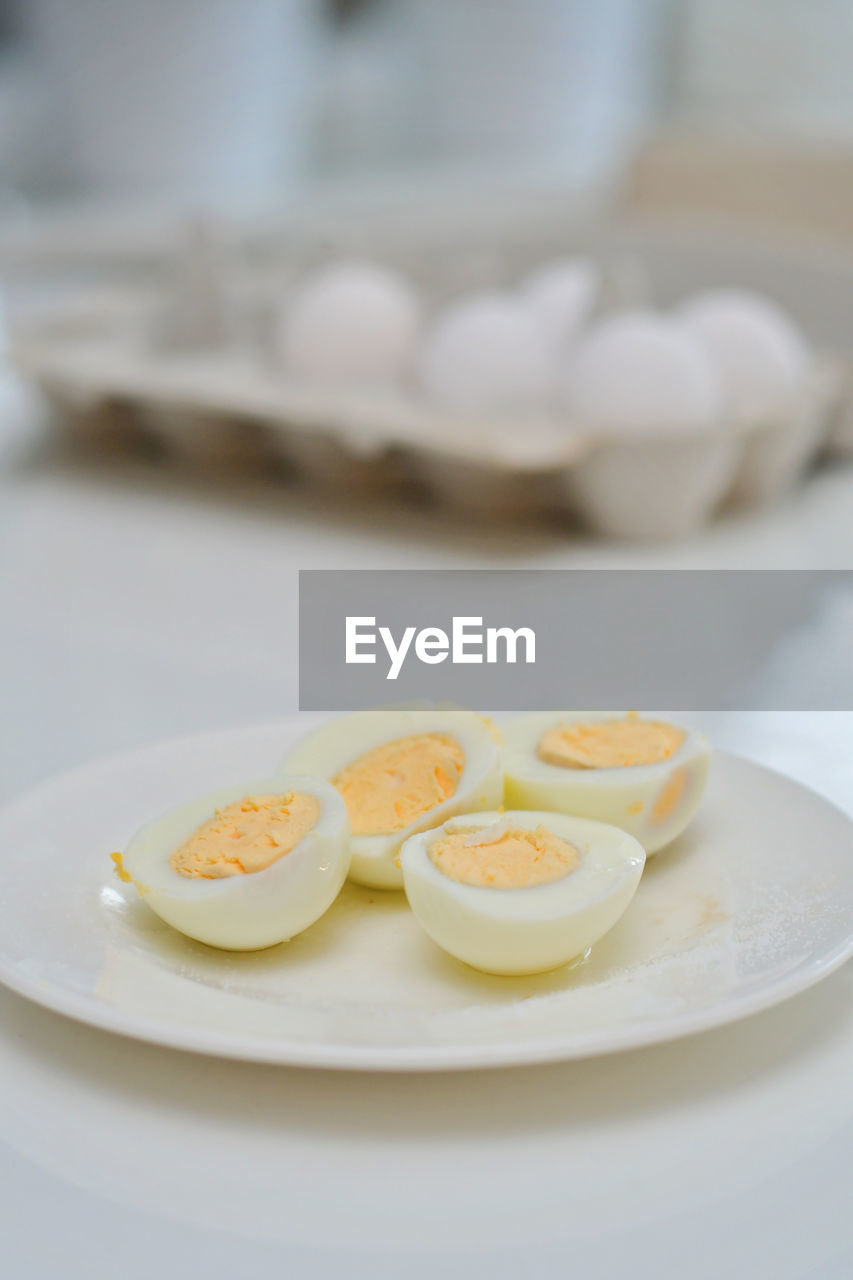 food and drink, food, egg, healthy eating, plate, freshness, wellbeing, breakfast, indoors, no people, produce, egg yolk, close-up, focus on foreground, meal, dish, table, icing, white, boiled, still life