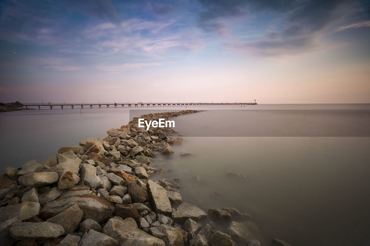 Scenic view of sea against sky during sunset