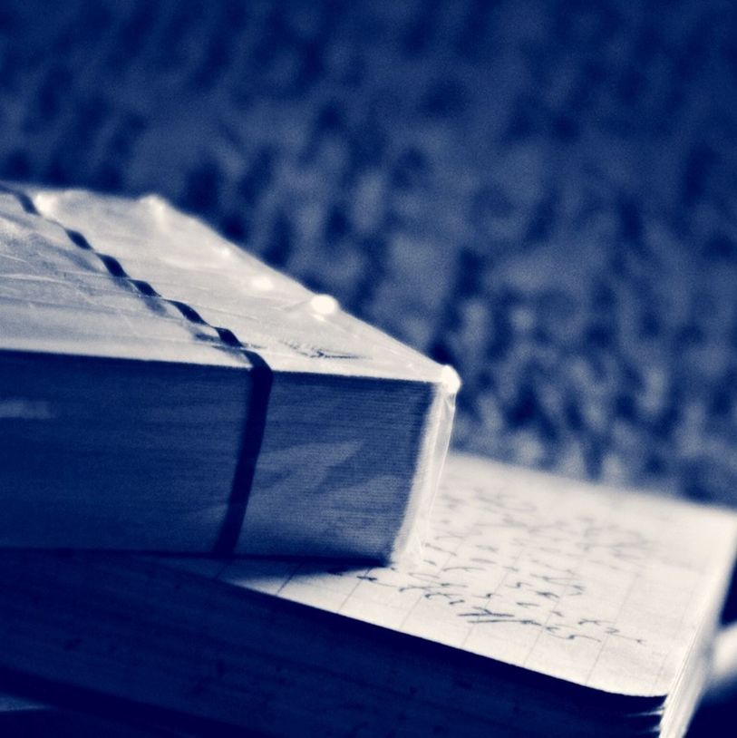 book, close-up, selective focus, no people, page, indoors, table, paper, focus on foreground, education, musical note, day, keyboard