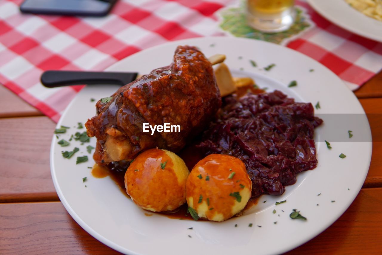 High angle view of bavarian food in plate on table