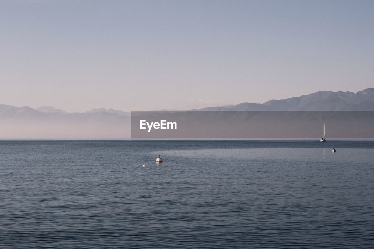 Scenic view of sea against clear sky