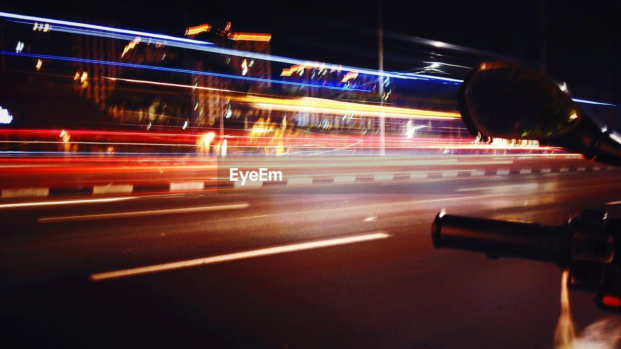 TRAFFIC ON ROAD AT NIGHT