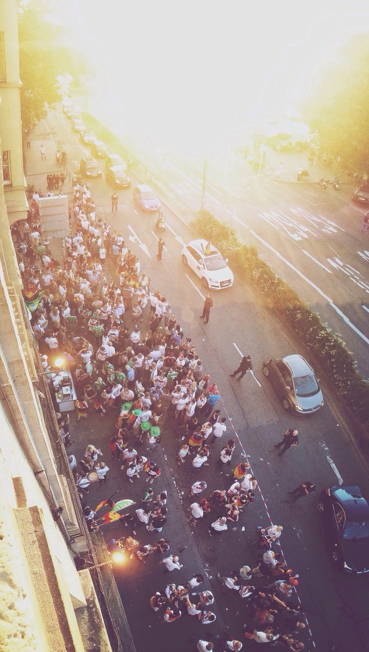 High angle view of crowd gathered on street during football match