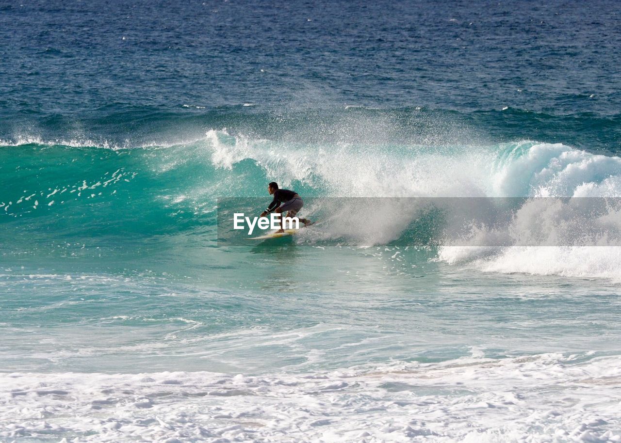 Man surfing in sea