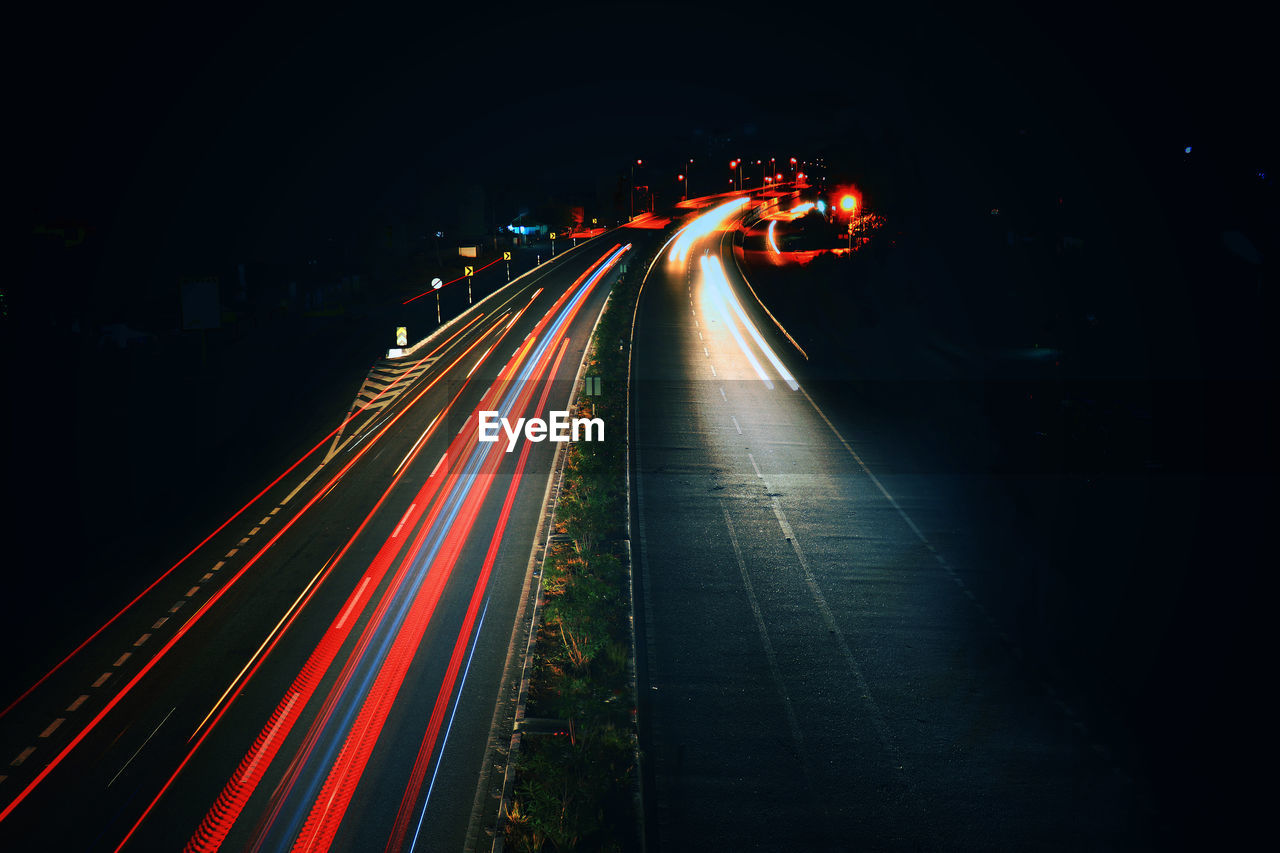 Light trails on road at night