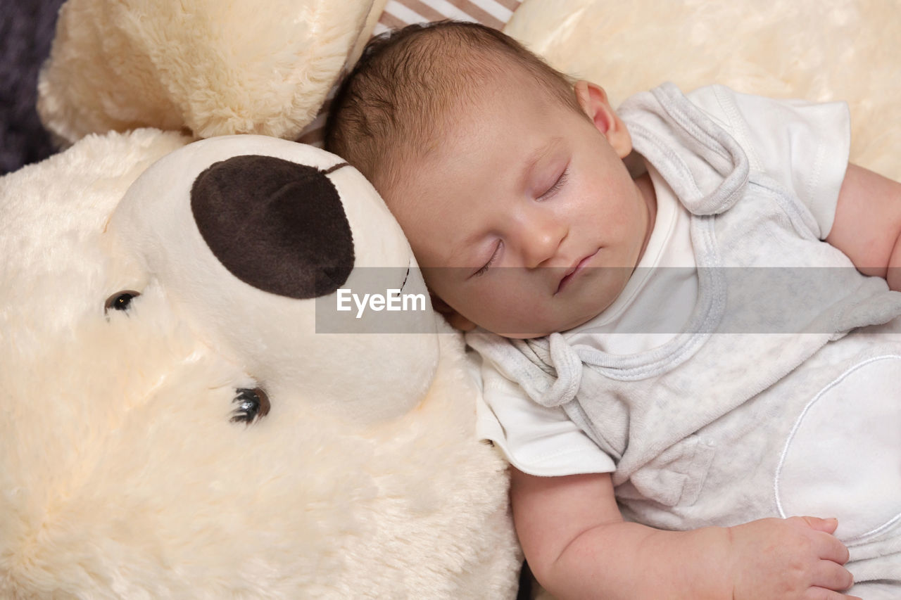 CUTE BABY SLEEPING IN TOY