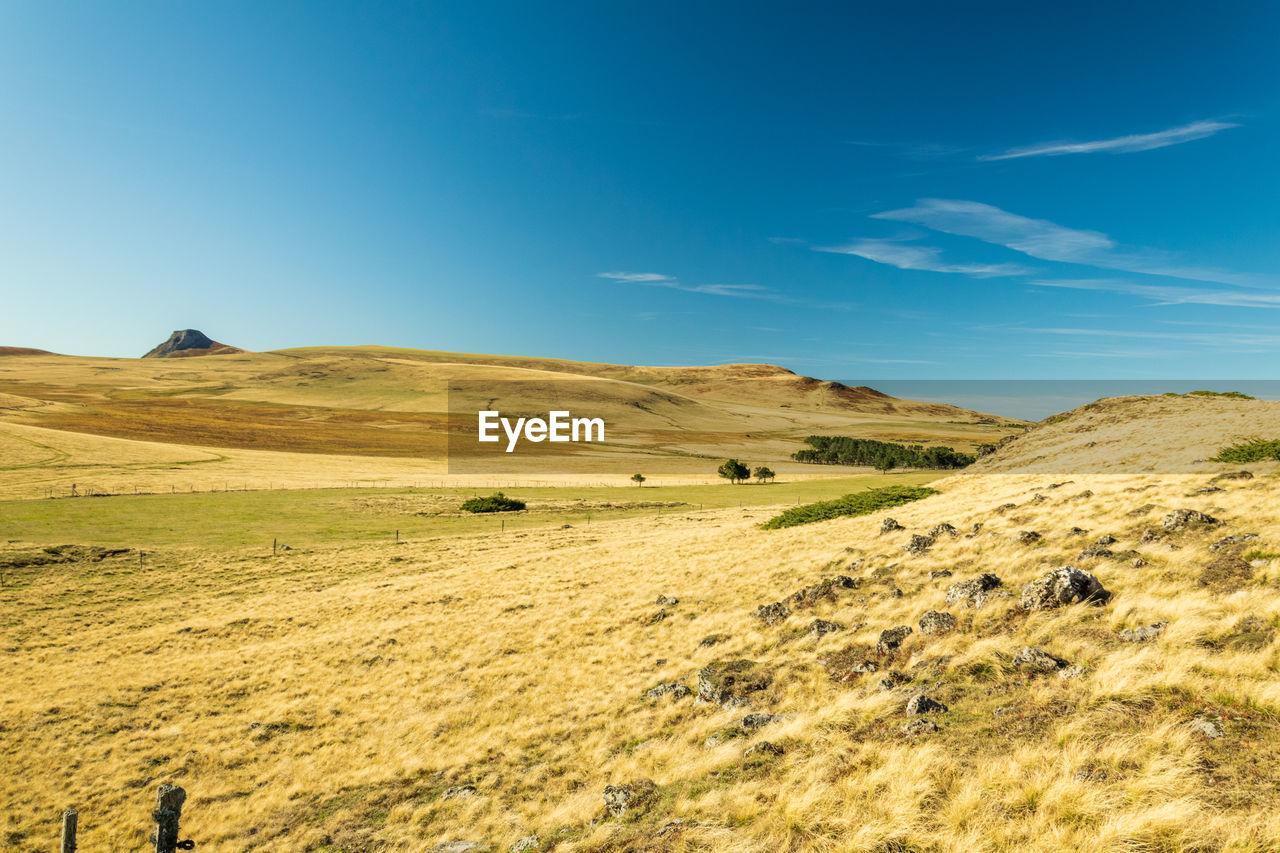 In the foreground of photography you can see the remains of fossilized volcanic stones 