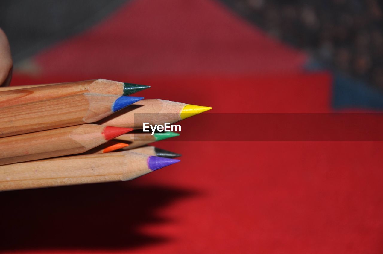 pencil, red, writing instrument, multi colored, colored pencil, close-up, indoors, craft, education, writing, no people, wood, creativity, still life, art, paper, learning, sharp, focus on foreground, selective focus