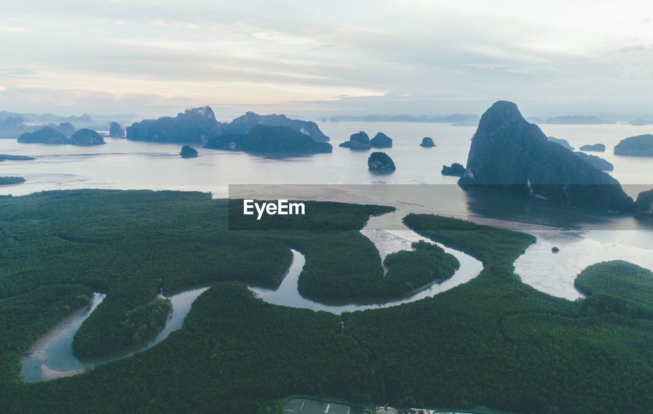 Aerial view of rock formations in sea