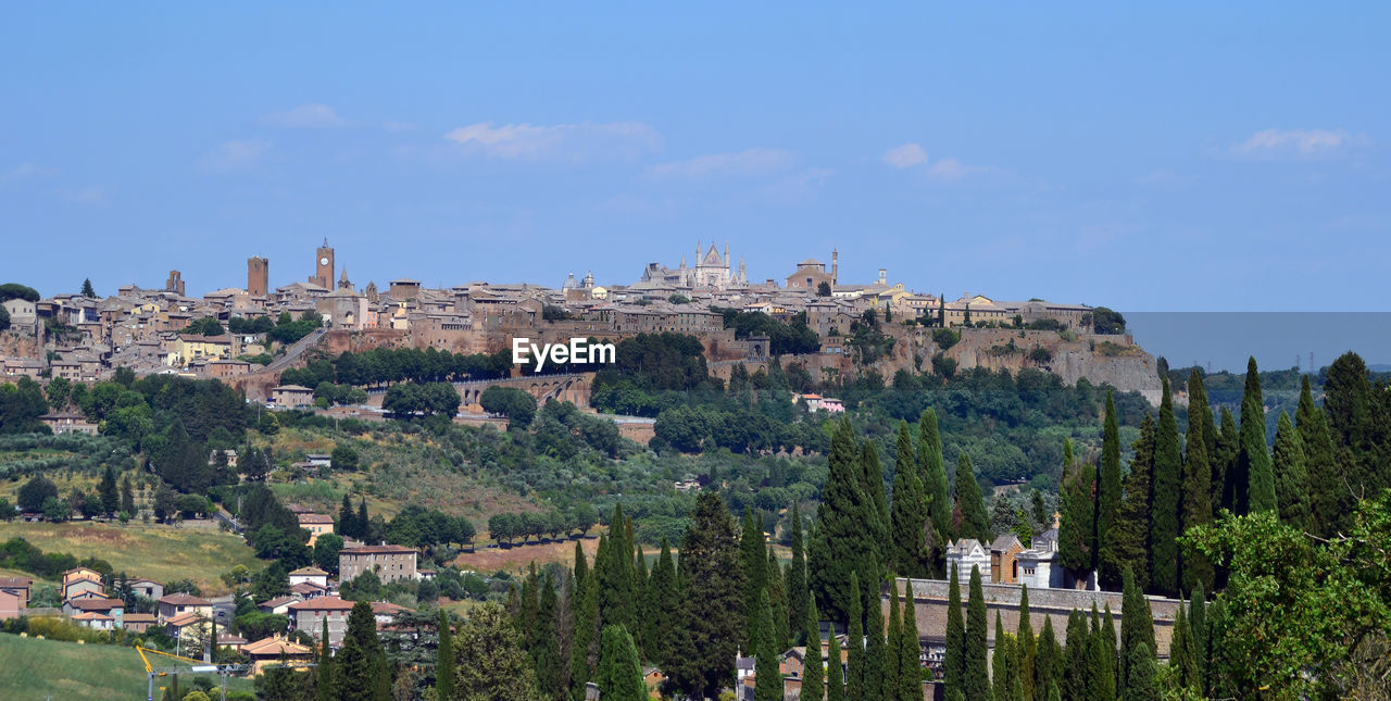 TOWNSCAPE AGAINST SKY