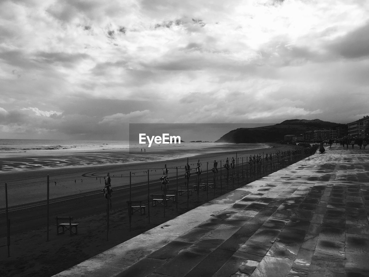 Scenic view of sea against cloudy sky