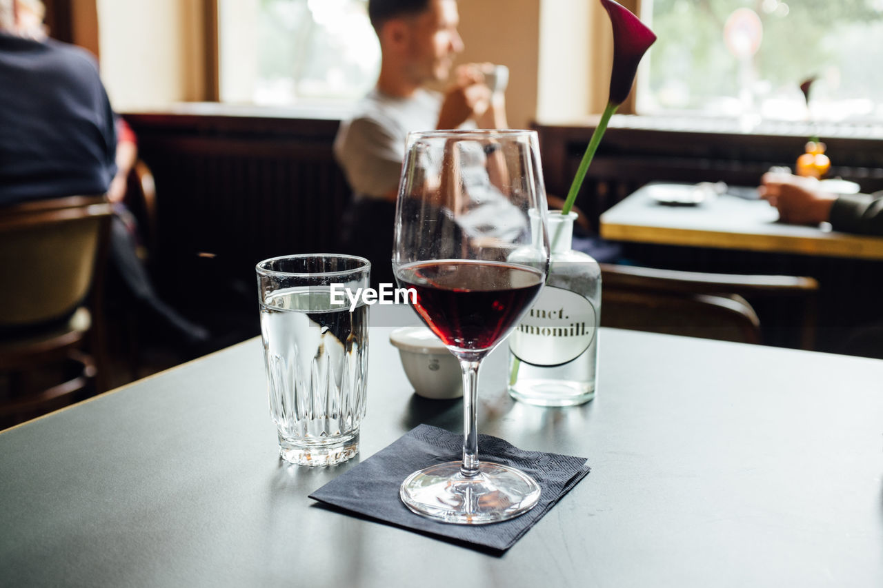 Close-up of red wine on table at restaurant