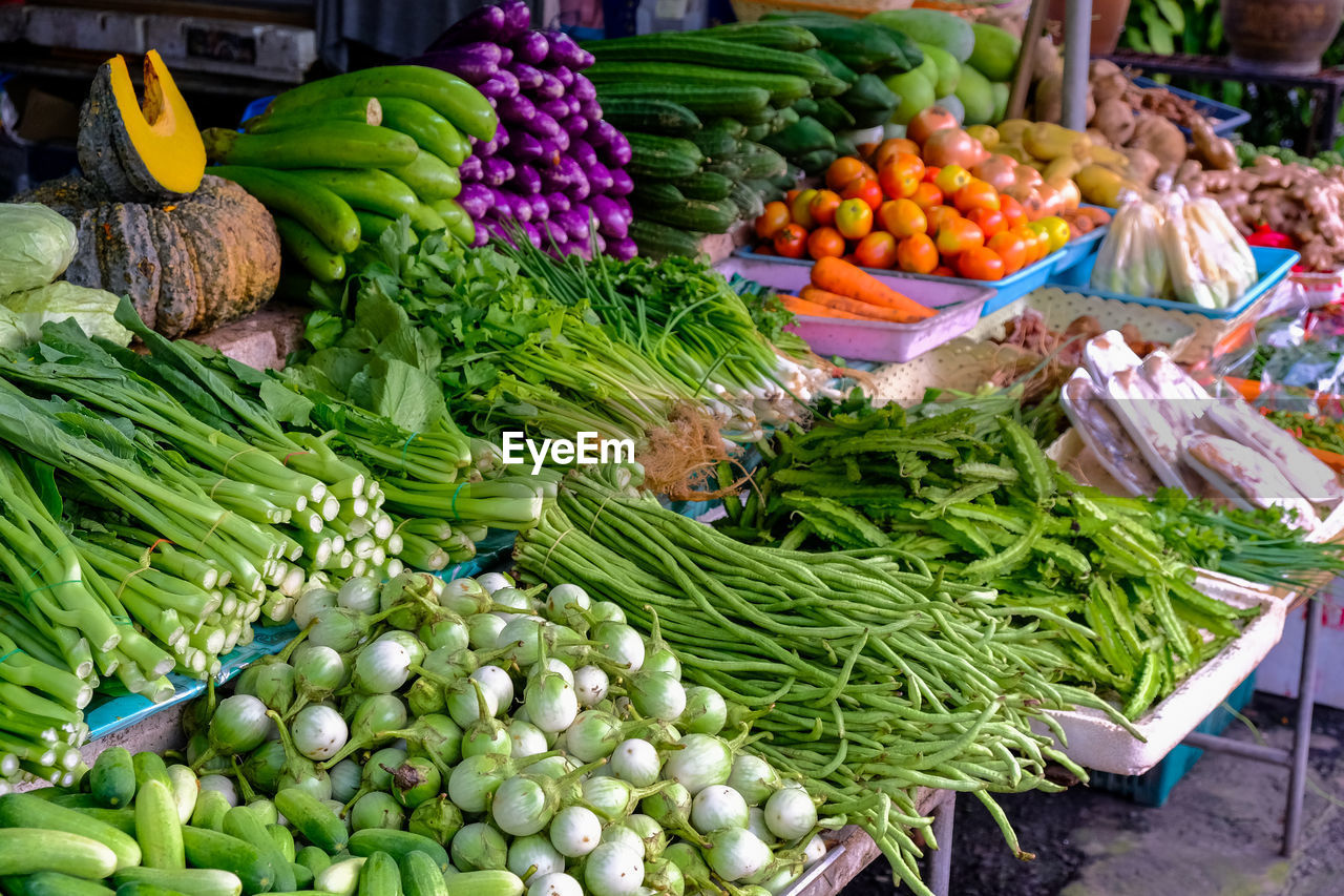 VEGETABLES FOR SALE IN MARKET STALL