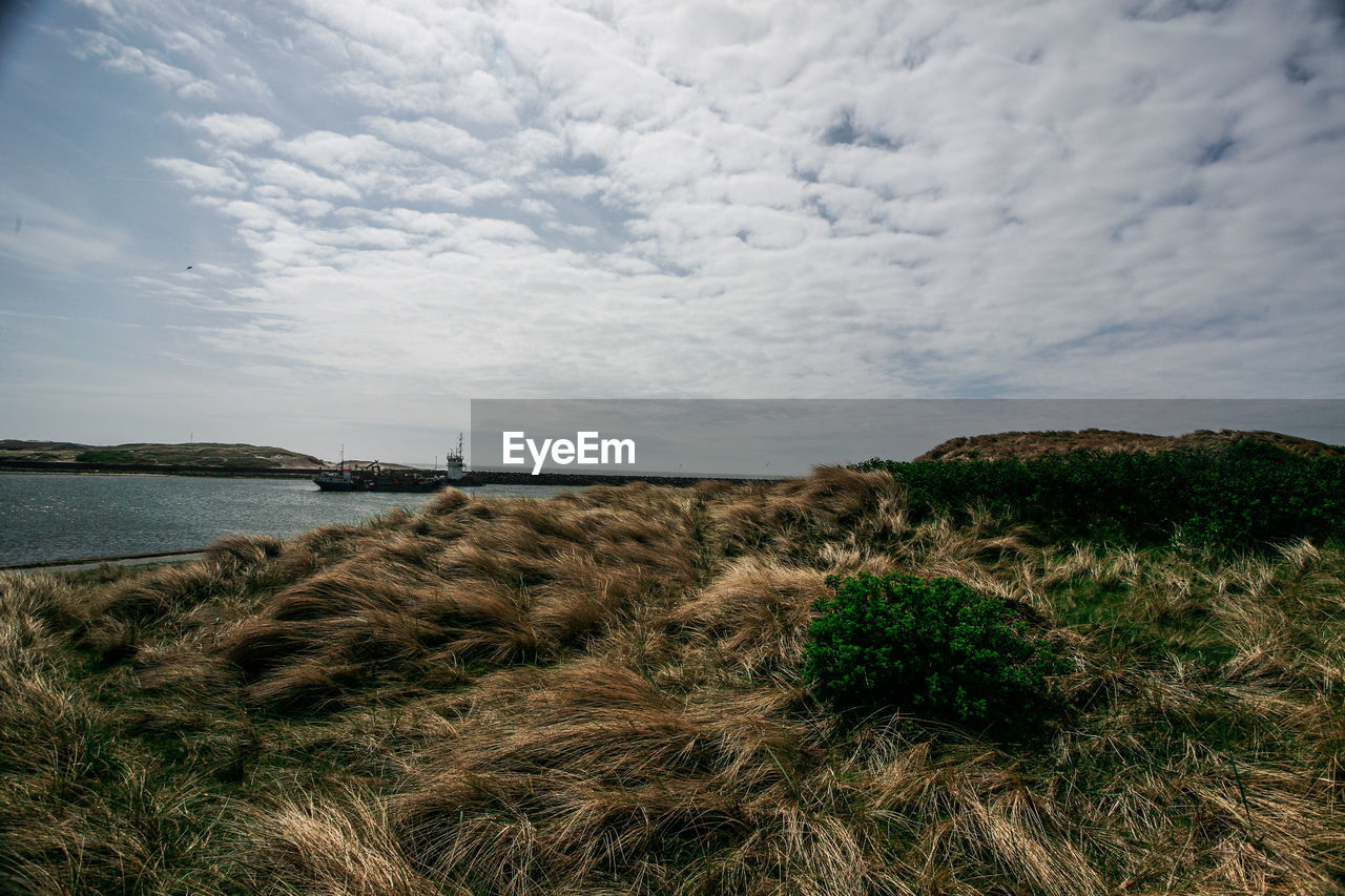 View of sea against cloudy sky