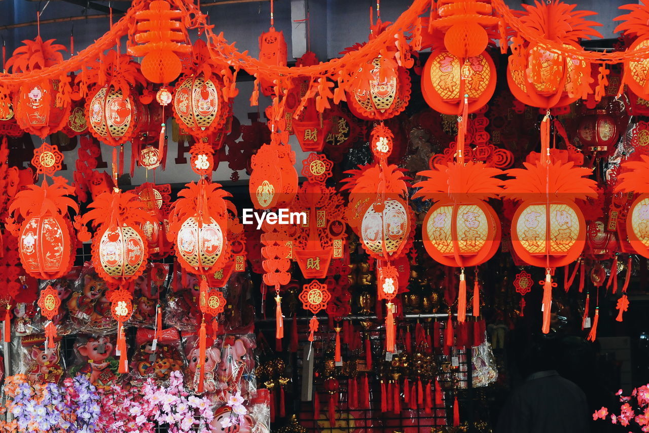 ILLUMINATED LANTERN HANGING AT NIGHT