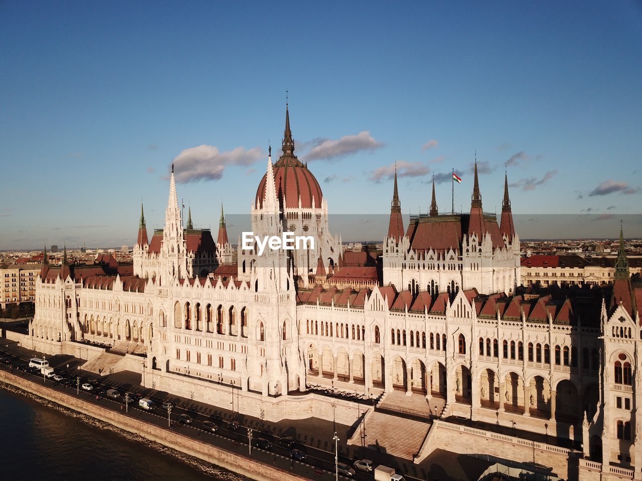 Panoramic view of buildings in city against sky