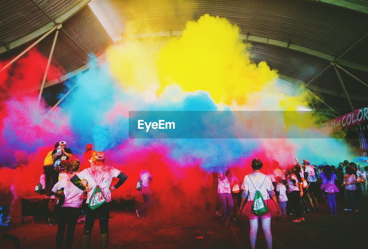 Crowds playing holi