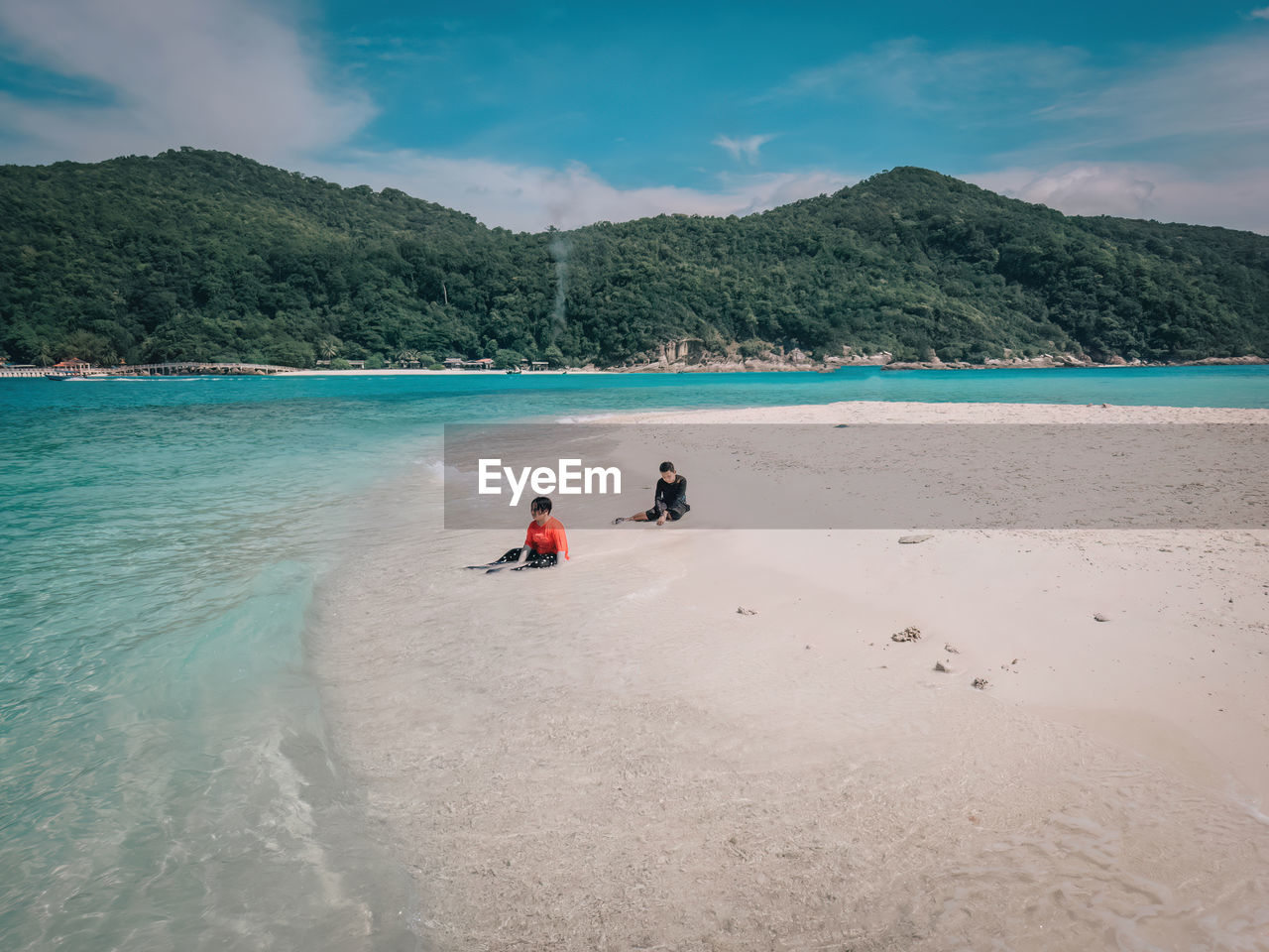 scenic view of sea against mountain