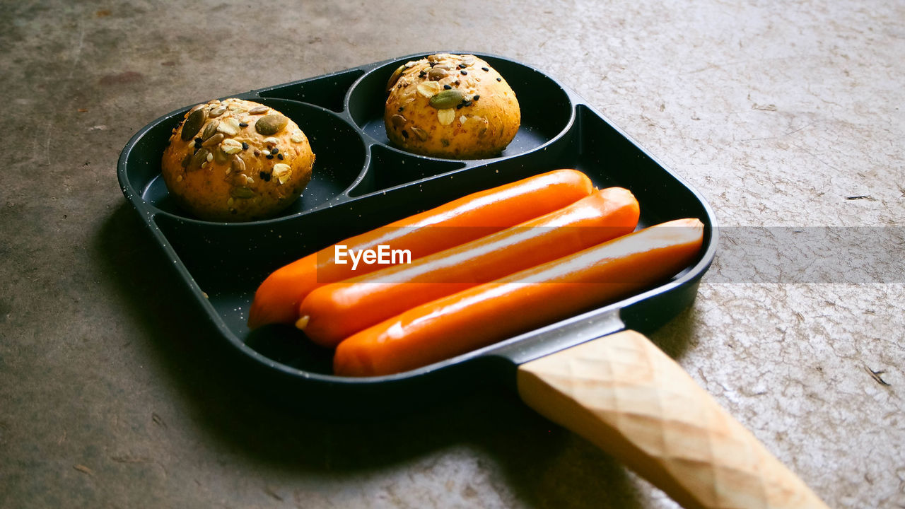 food, food and drink, fast food, freshness, dish, healthy eating, high angle view, vegetable, carrot, produce, no people, wellbeing, root vegetable, cuisine, meal, indoors, still life, table, kitchen utensil