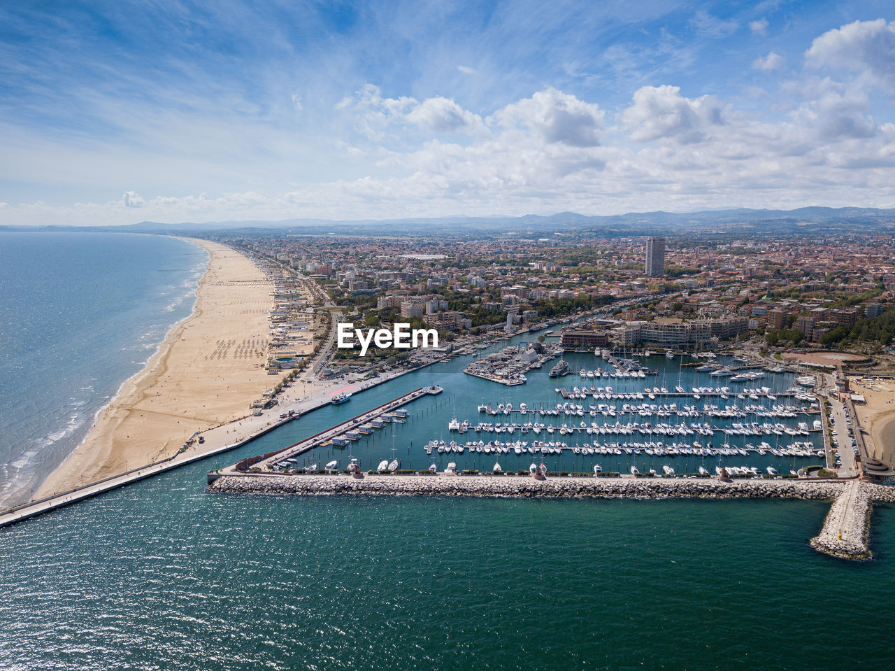 Panoramic view of rimini, its sea, its beaches and its port on the romagna riviera in post-pandemic 