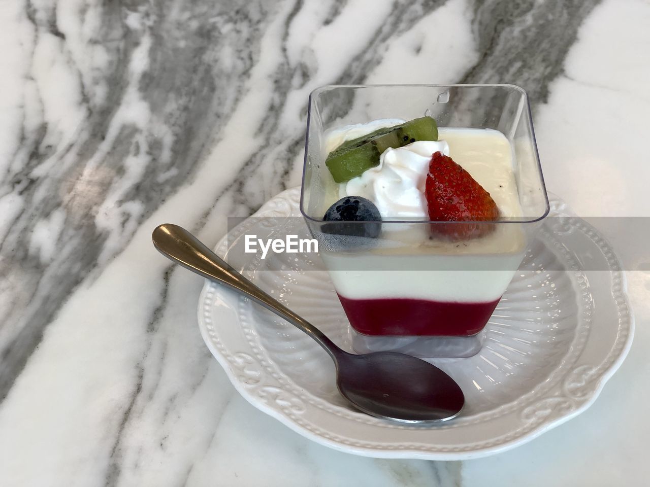 High angle view of dessert  in plate strawberry panna cotta