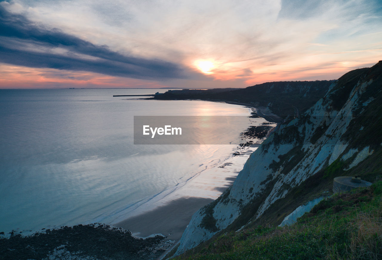 Scenic view of sea against sky during sunset