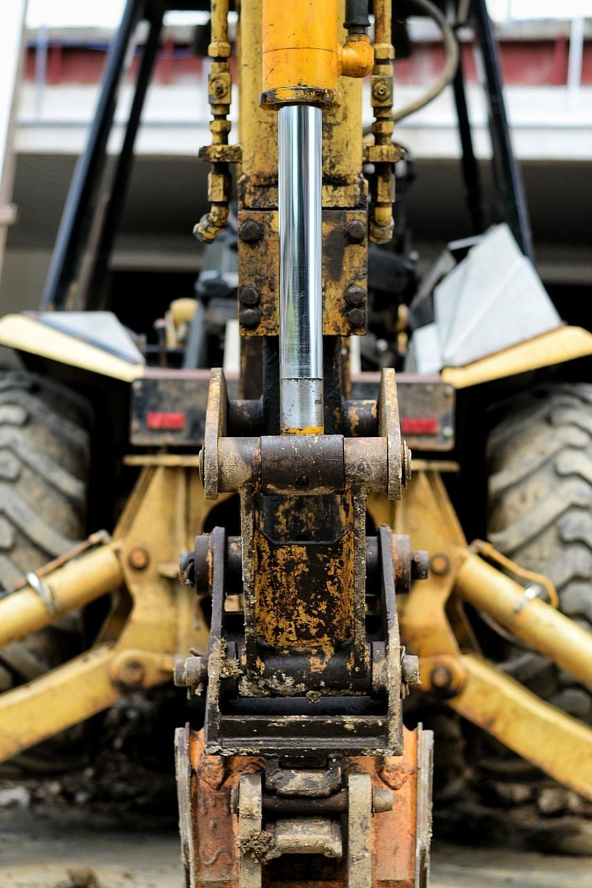 CLOSE-UP OF MACHINE PART OF TRAIN