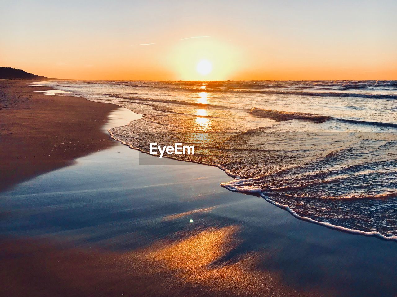 Scenic view of sea against sky during sunset