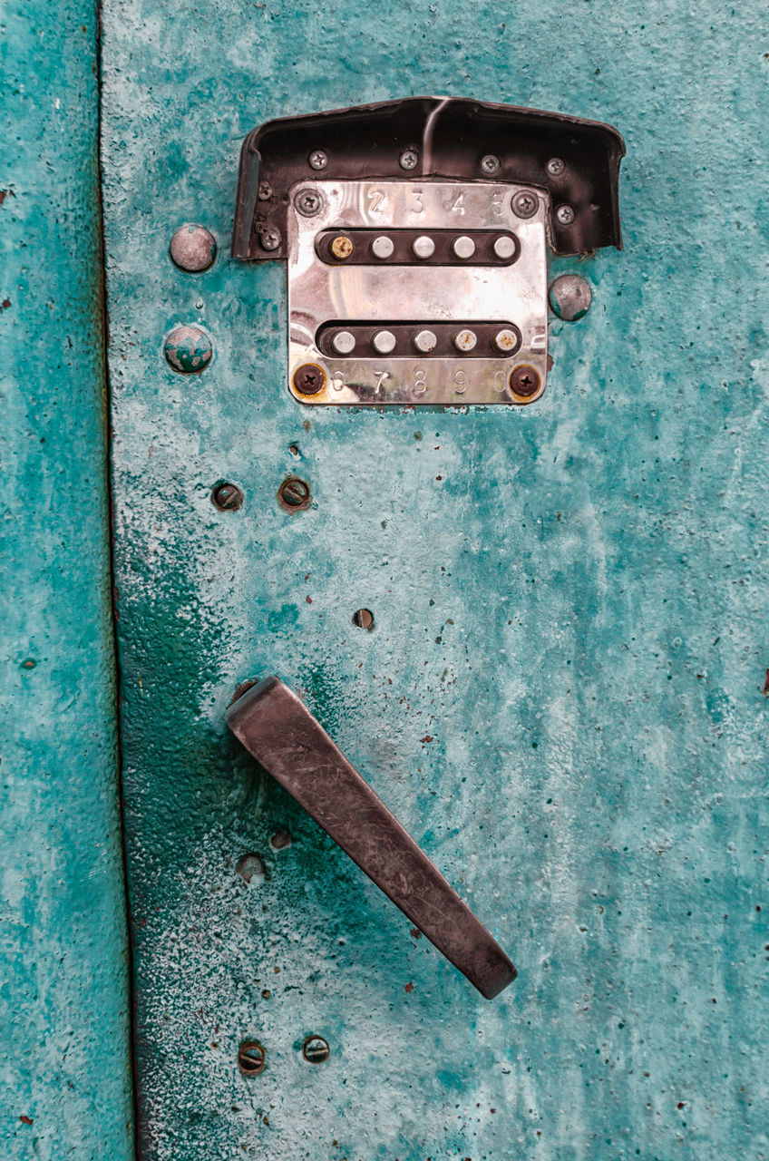 CLOSE-UP OF OLD BLUE DOOR