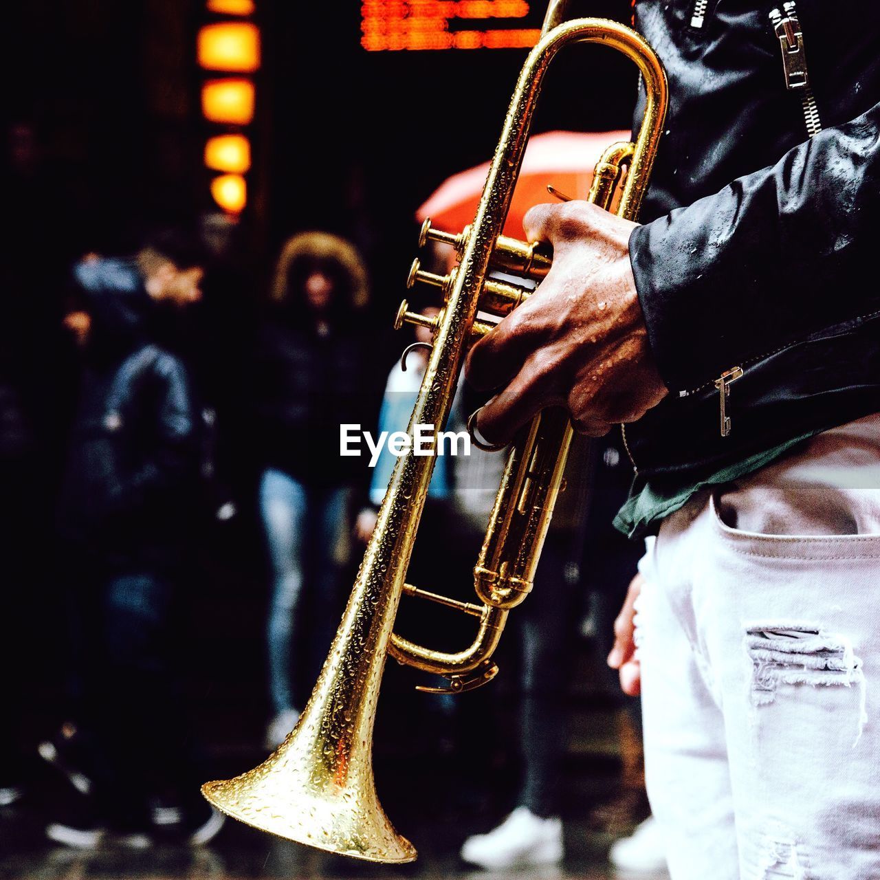 Close-up of man playing trumpet