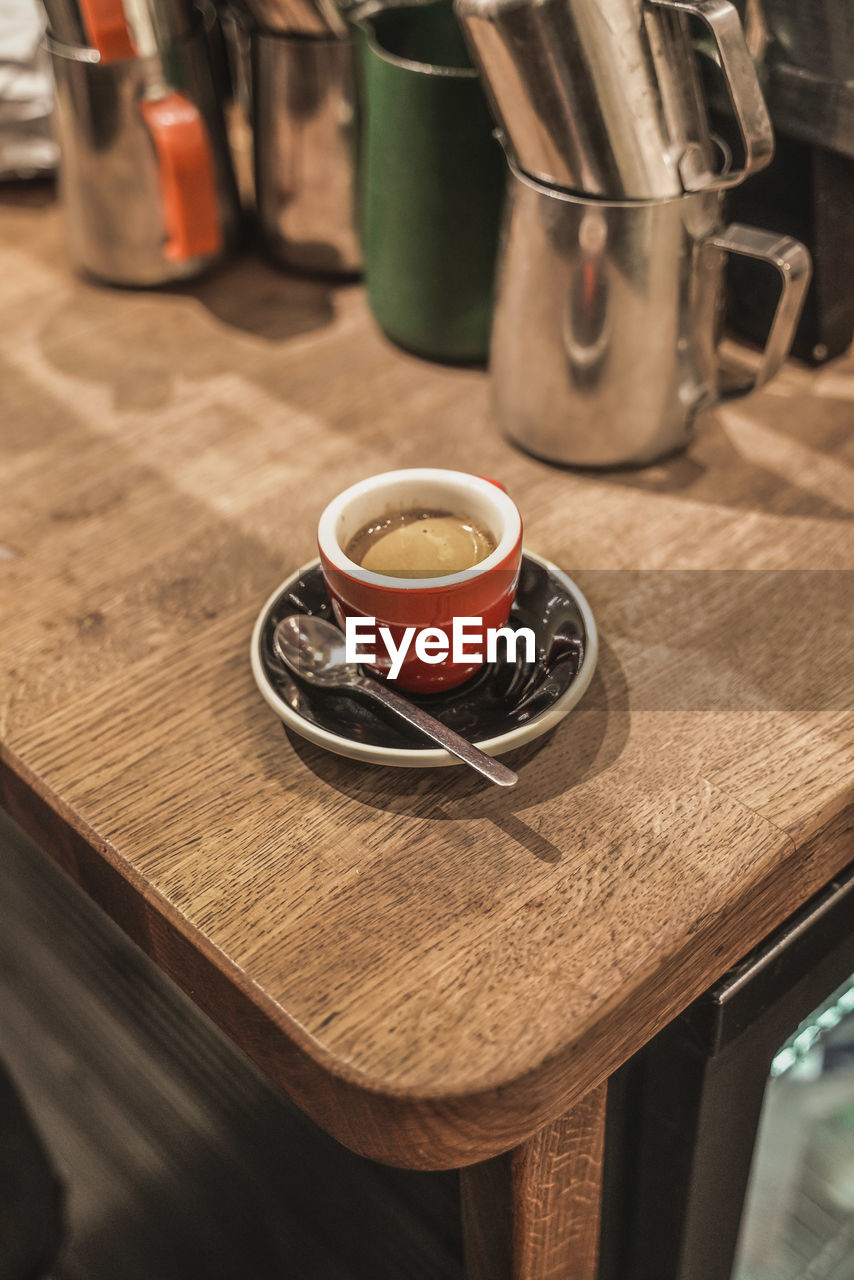 Coffee cup on table at cafe