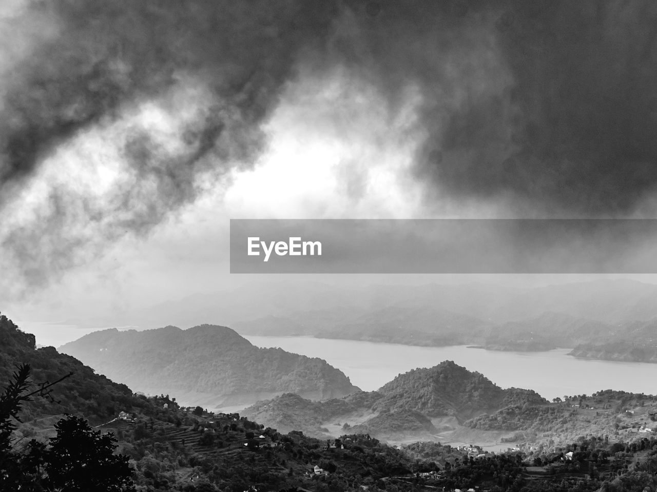mountain, environment, landscape, black and white, cloud, scenics - nature, sky, beauty in nature, mountain range, monochrome photography, monochrome, nature, fog, land, no people, travel, travel destinations, dramatic sky, outdoors, tranquility, tree, forest, darkness, storm, mountain peak, cloudscape, overcast, non-urban scene, tranquil scene, tourism, plant, dramatic landscape, valley, awe