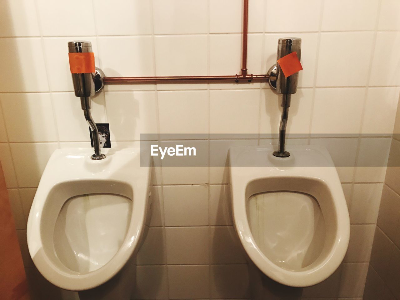 High angle view of urinals at bathroom