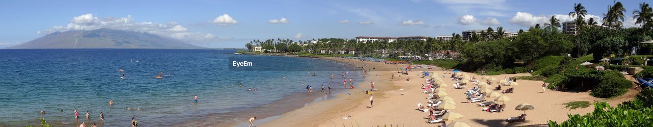 Panoramic view of people on beach