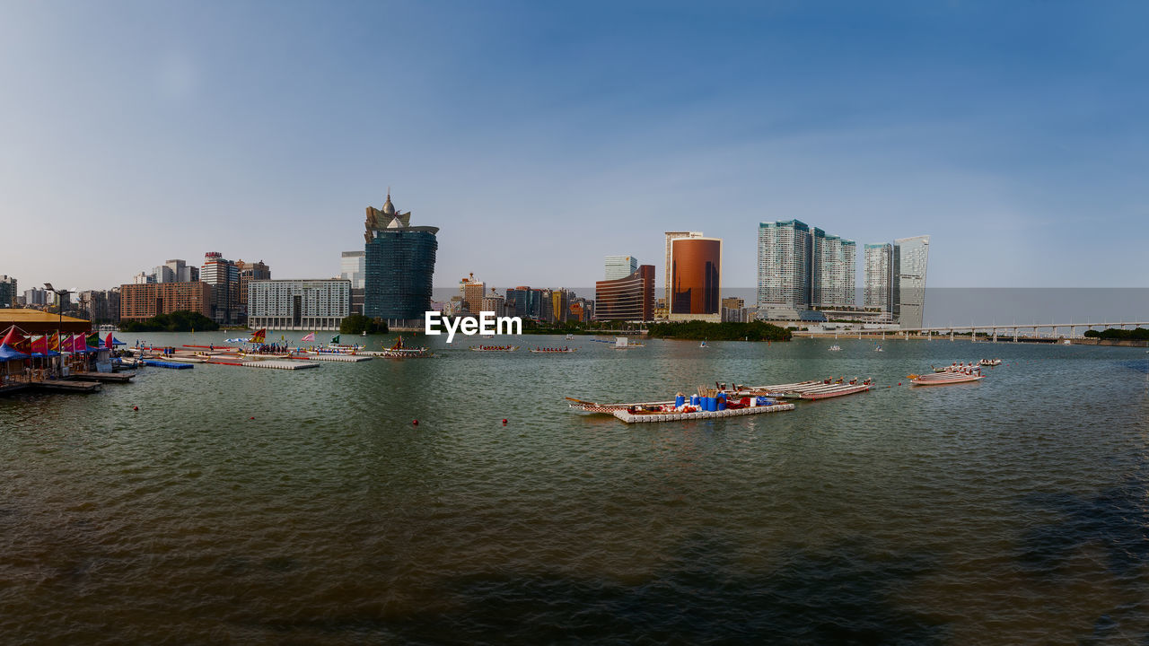 Panorama of the macau waterfront during dragon boat festival