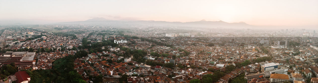 High angle shot of townscape against sky