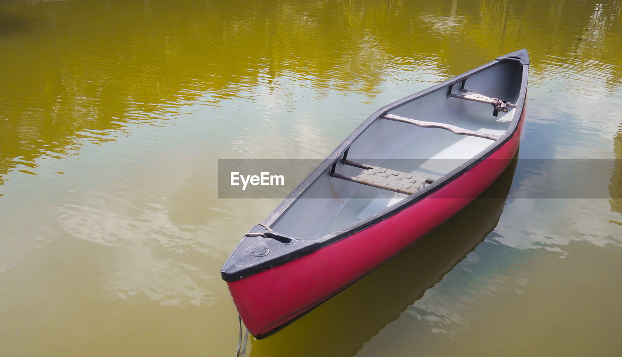 water, nautical vessel, boat, vehicle, transportation, reflection, boating, lake, mode of transportation, nature, watercraft, canoe, no people, day, moored, outdoors, tranquility, dinghy, oar, paddle