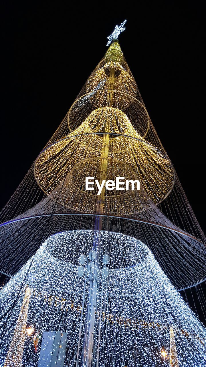Low angle view of christmas tree made of illuminated lights