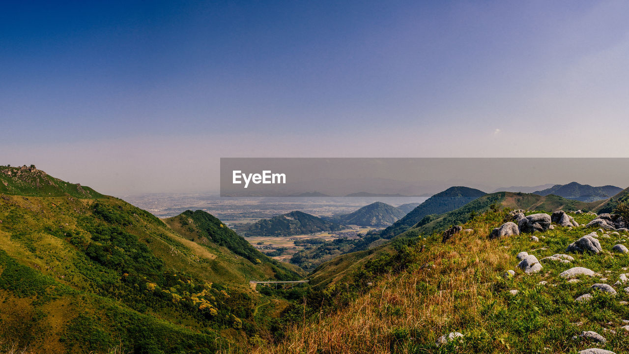 Scenic view of mountains against clear sky