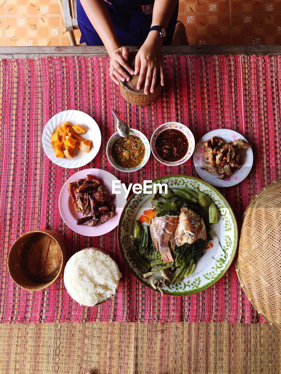 High angle view served traditional food on table