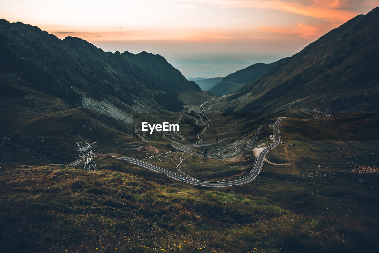 Scenic view of mountains against sky during sunset