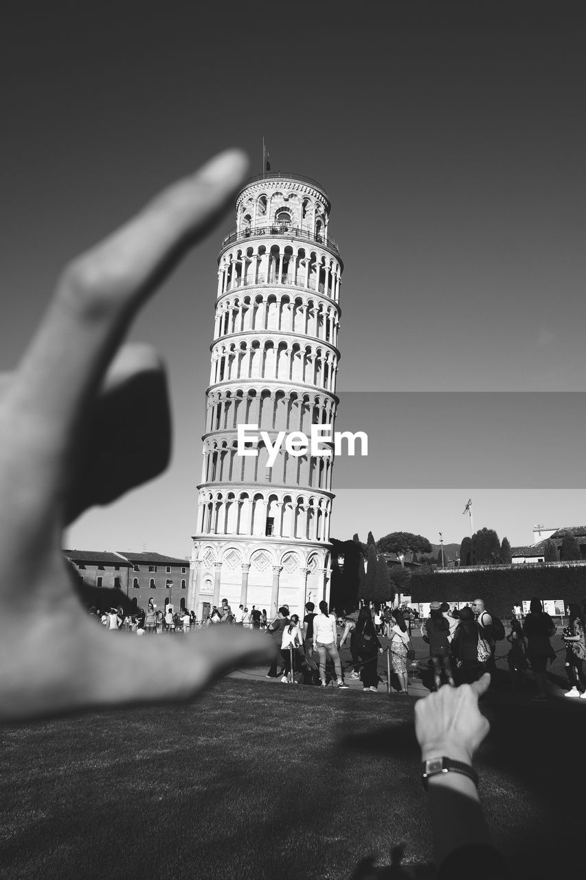 LOW ANGLE VIEW OF PEOPLE TOWER