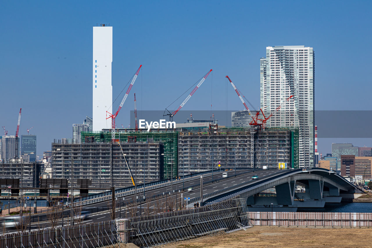 MODERN BUILDINGS AGAINST CLEAR SKY