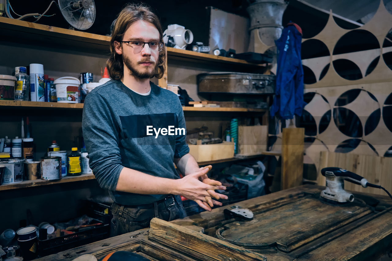 Portrait of man working at workshop