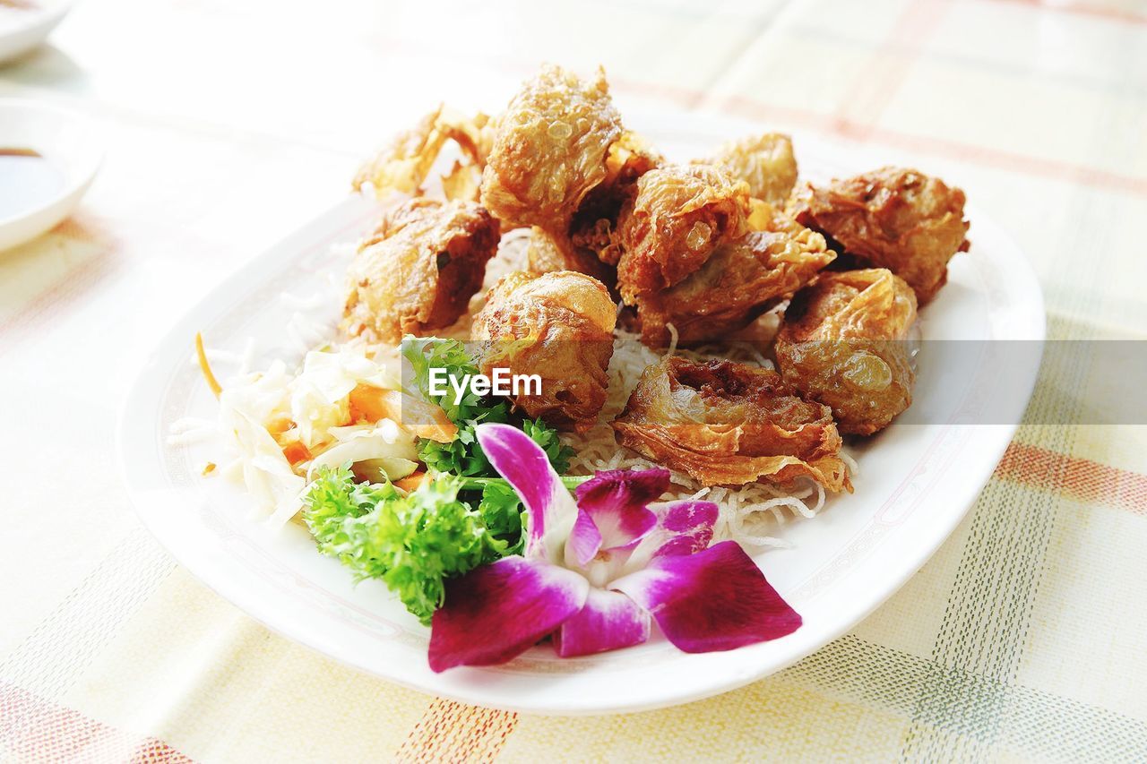 CLOSE-UP OF SERVED FOOD IN PLATE