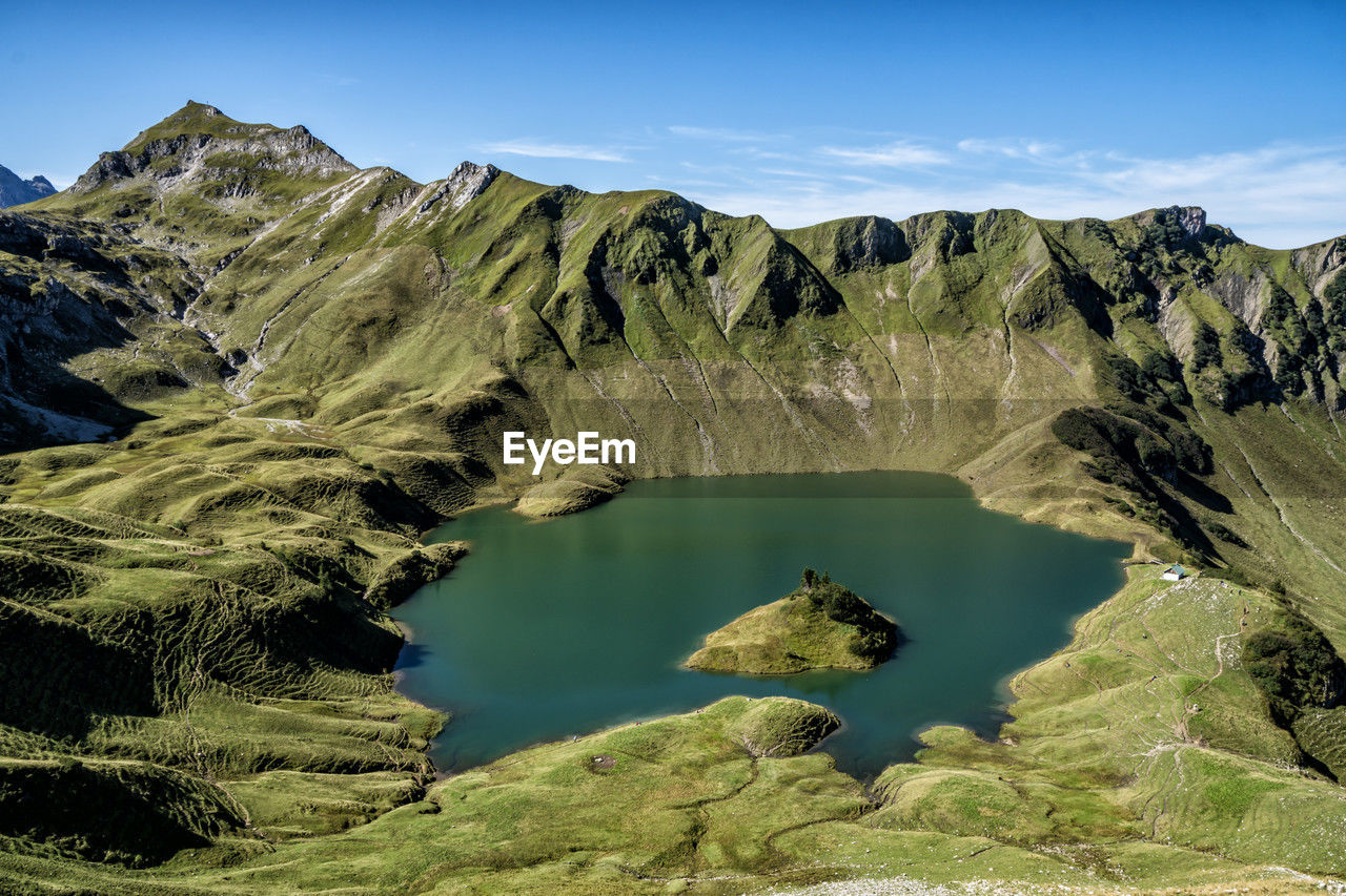panoramic view of lake and mountains against sky