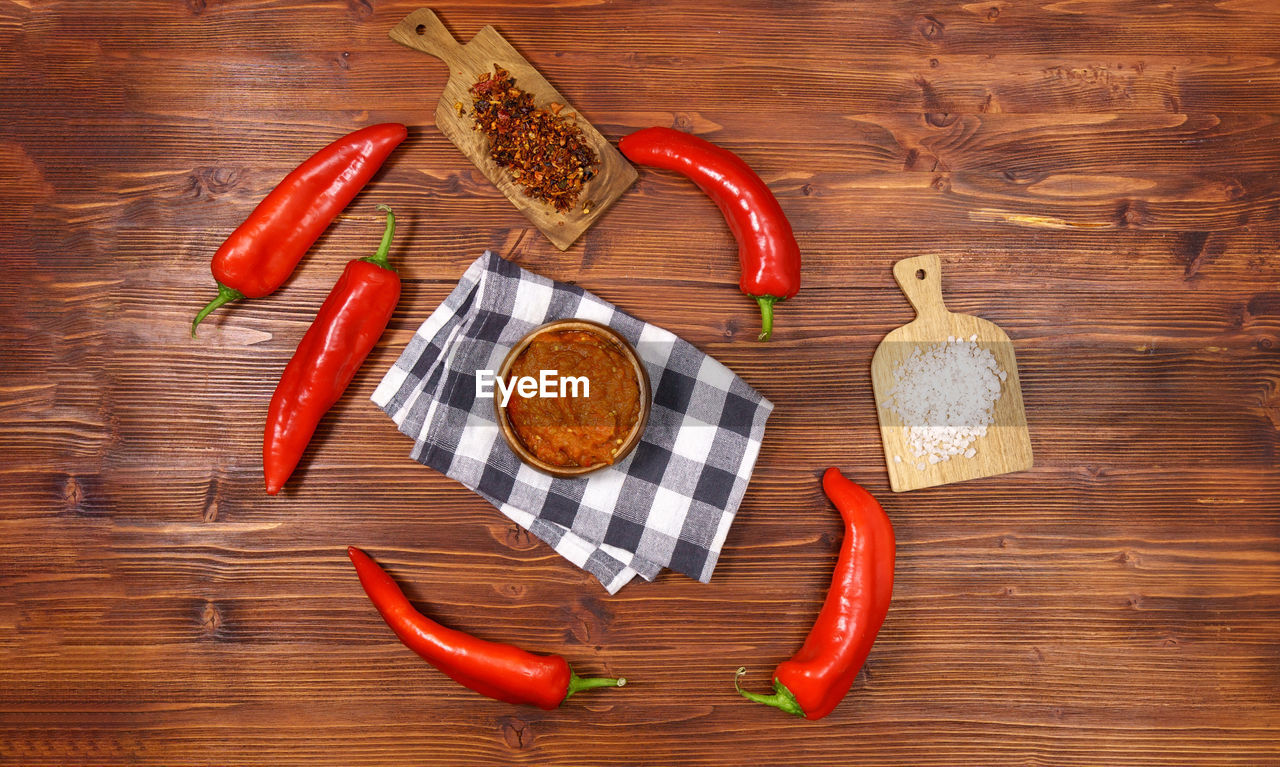 directly above shot of various ingredients on wooden table