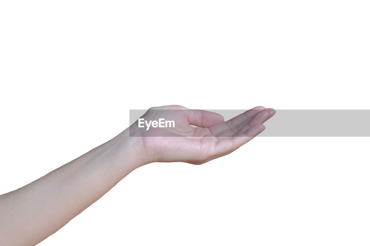 Close-up of hand against black background