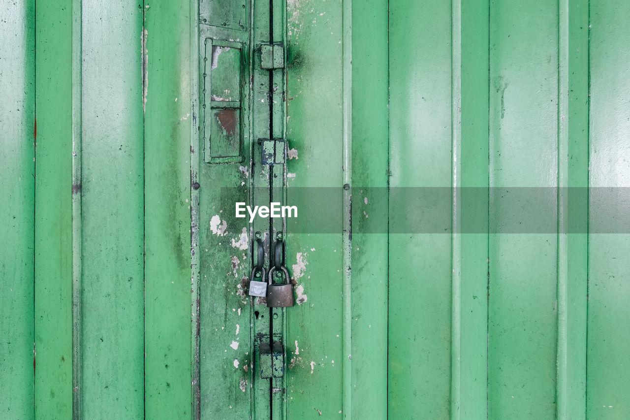 Close up view of green security door